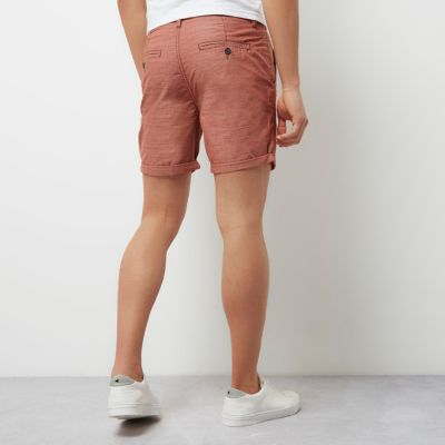 Red textured slim fit casual shorts
